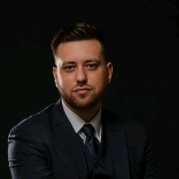 Adam D.
