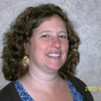 Ashley Bell, P.G.
