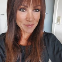 Ina C.