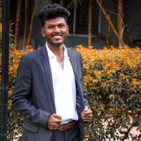 Dhanesh N