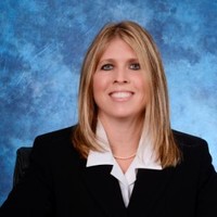 Karen E. Comery