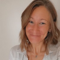 Nikki Singiser Lat, Atc