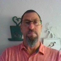 Scott J Evans