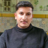 Ravisha M R