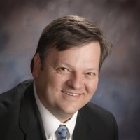 Mark E. Nicholas
