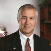 Thomas H. Scheider, CPCU, CLU, CRIS