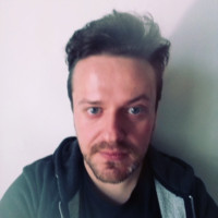 Maciej Badura (He/Him)