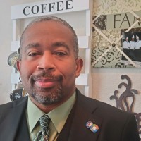 J. Elliot Howard, MBA, M.A.