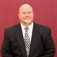 Larry Corn, P.G.