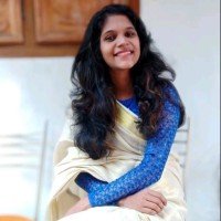 Aruna M