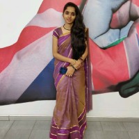 Divya L