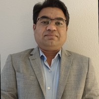 Dr. Mangesh D. Pustode