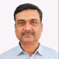 K. Adil