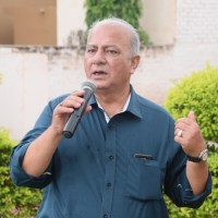 S.K. DHAR