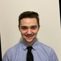 ETHAN HOLLAND