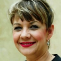 Maria E Torres