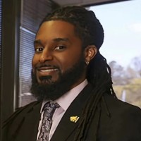 D. Denzil Covington
