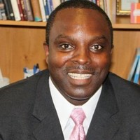 Tony Holmes, Mba