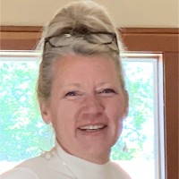 TRACY ROE