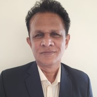 Dr. Bhushan Gadgil