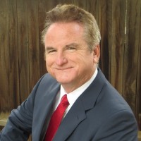 Larry Koman, Cpcu