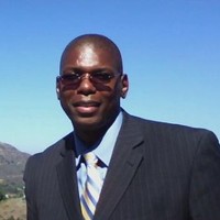 Dr. Derrick L. Tinsley