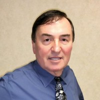 Antonio Komotar, PhD, MBA.