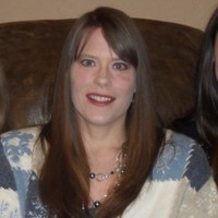 Lisa M. Schuh, CPA, CMA, CFM