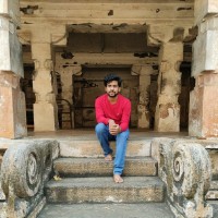 Thanuj M