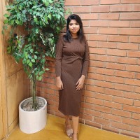 Veena B