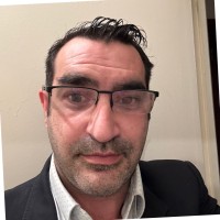 Nicolas E.