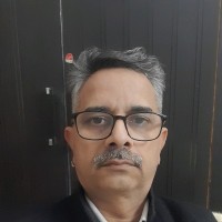 Dr Mahendra Singh