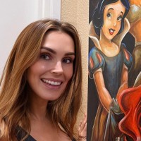 Laura Adiucb