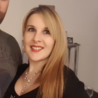 Tina Culotta Theron