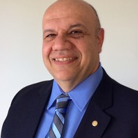 Domenico Bartolo, B.A., FRI(E), AMP, AICB