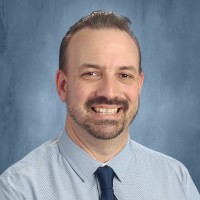 Dr. Charles Bachand