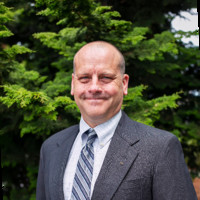 Mark W. Olenich
