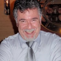 EUGENE MILKIS