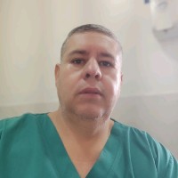 Dr. Carlos Aguirre Canchiña