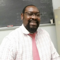Divine Wanduku, Ph.D.