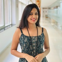 Nisha K