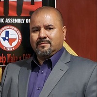 Sam C Gomez