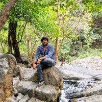Tharun B.