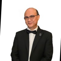 Dr. KM (Gerald) Tan