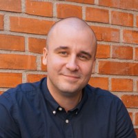 Adam B.