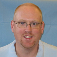 Troy D Mills