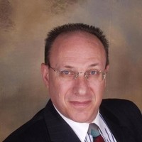 Garry A. Klein, GRI, CNE, PMP, ASD