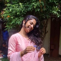 Dinesha T