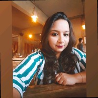Nisha B