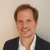 Dr. Christian Herles